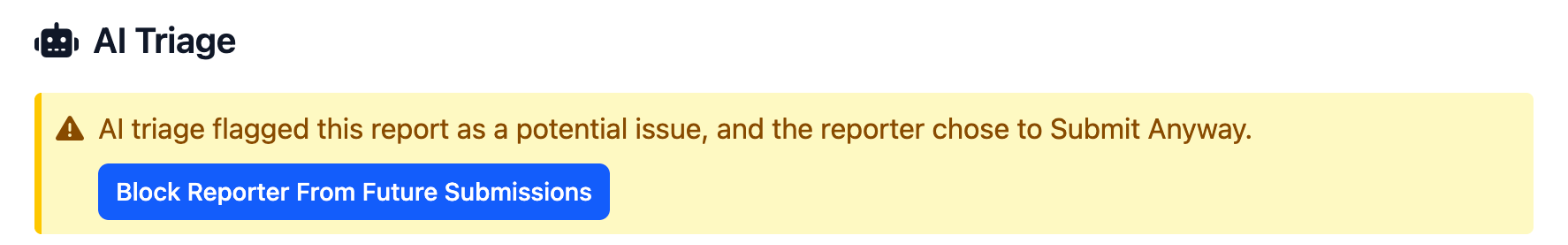 The AI Triage section of a report. A yellow warning reads “AI triage flagged this report as a potential issue, and the reporter chose to Submit Anyway.” A blue button below it reads “Block Reporter From Future Submissions.”